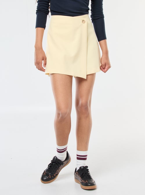 Saia-calção assimétrica com botão dourado - Kiabi