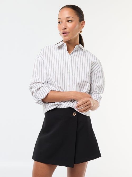 Saia-calção assimétrica com botão dourado - Kiabi