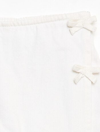 Saia-calção curta em ganga com nós