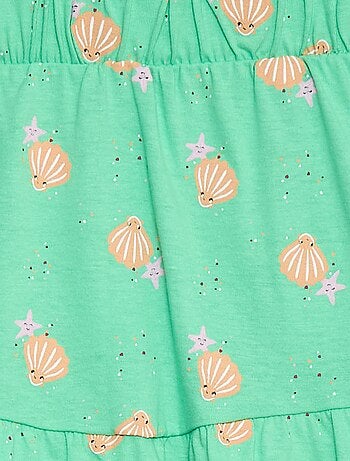 Saia com folhos estampada