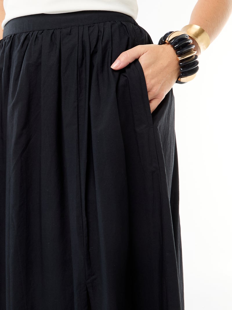 Saia comprida e larga evasê Preto - Kiabi