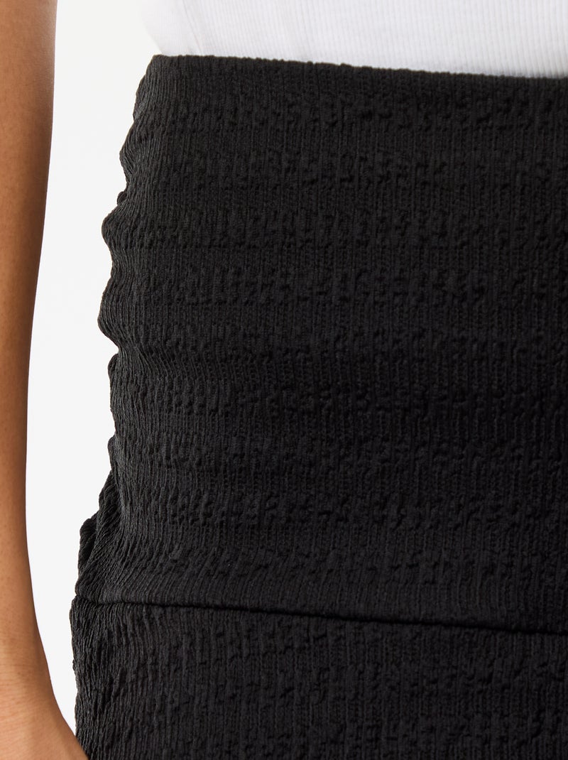 Saia curta com folhos em malha crinckle Preto - Kiabi