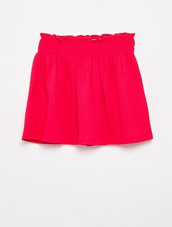 Saia curta estilo skater com calções integrados