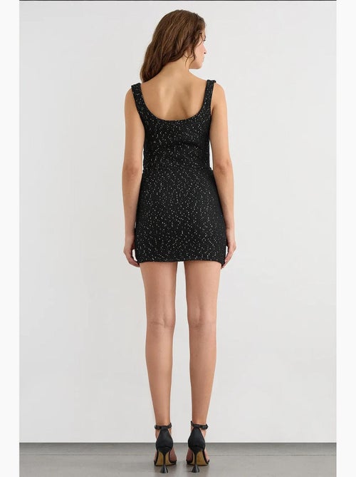 Saia envolvente de malha com lantejoulas, bainha sem costuras e cinto hiccup - Kiabi Saia envolvente de malha com lantejoulas, bainha sem costuras e cinto hiccup - Kiabi