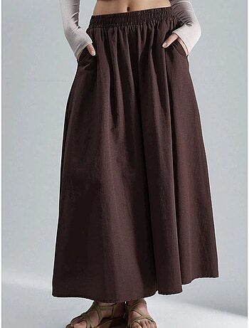 Saia maxi com cintura elástica e bolsos busem