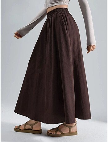 Saia maxi com cintura elástica e bolsos busem