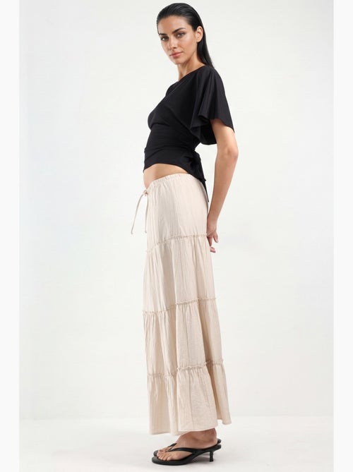 Saia maxi de cintura subida texturizada em linha a busem - Kiabi Saia maxi de cintura subida texturizada em linha a busem - Kiabi