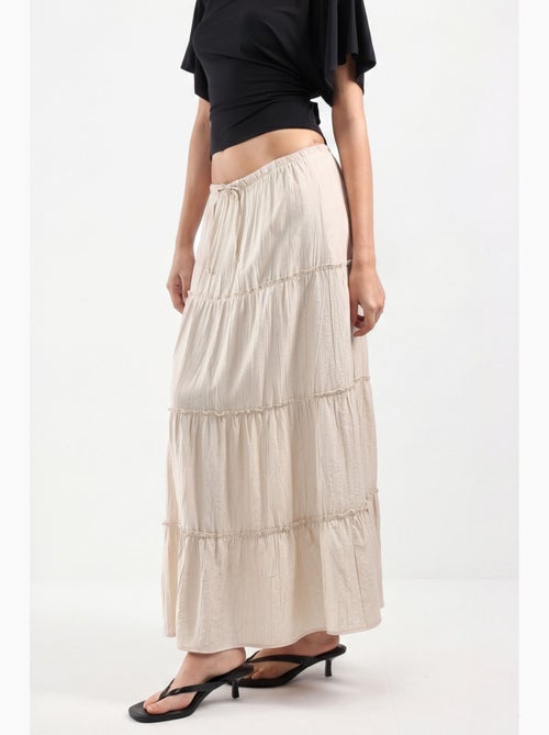 Saia maxi de cintura subida texturizada em linha a busem - Kiabi Saia maxi de cintura subida texturizada em linha a busem - Kiabi