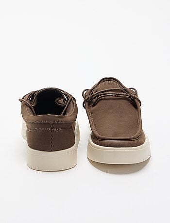 Sapatos de vela