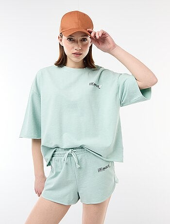 Short curto em french terry com inscrição