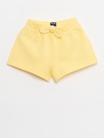 Short em malha jacquard liso com laço fantasia