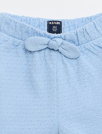 Short em malha jacquard liso com laço fantasia