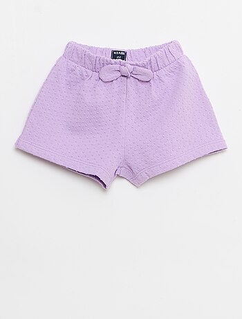 Short em malha jacquard liso com laço fantasia