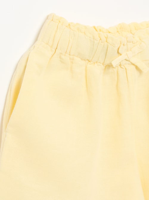 Short liso com laço fantasia - Kiabi Short liso com laço fantasia - Kiabi
