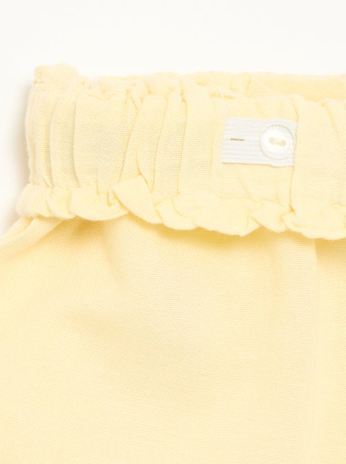 Short liso com laço fantasia - Kiabi Short liso com laço fantasia - Kiabi