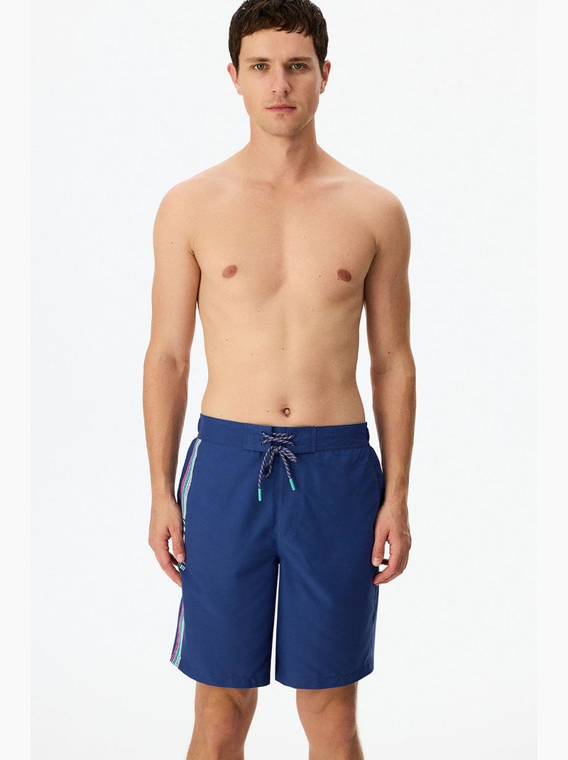 Short masculino surfer com estampa de slogan penti Azul-marinho - Kiabi
