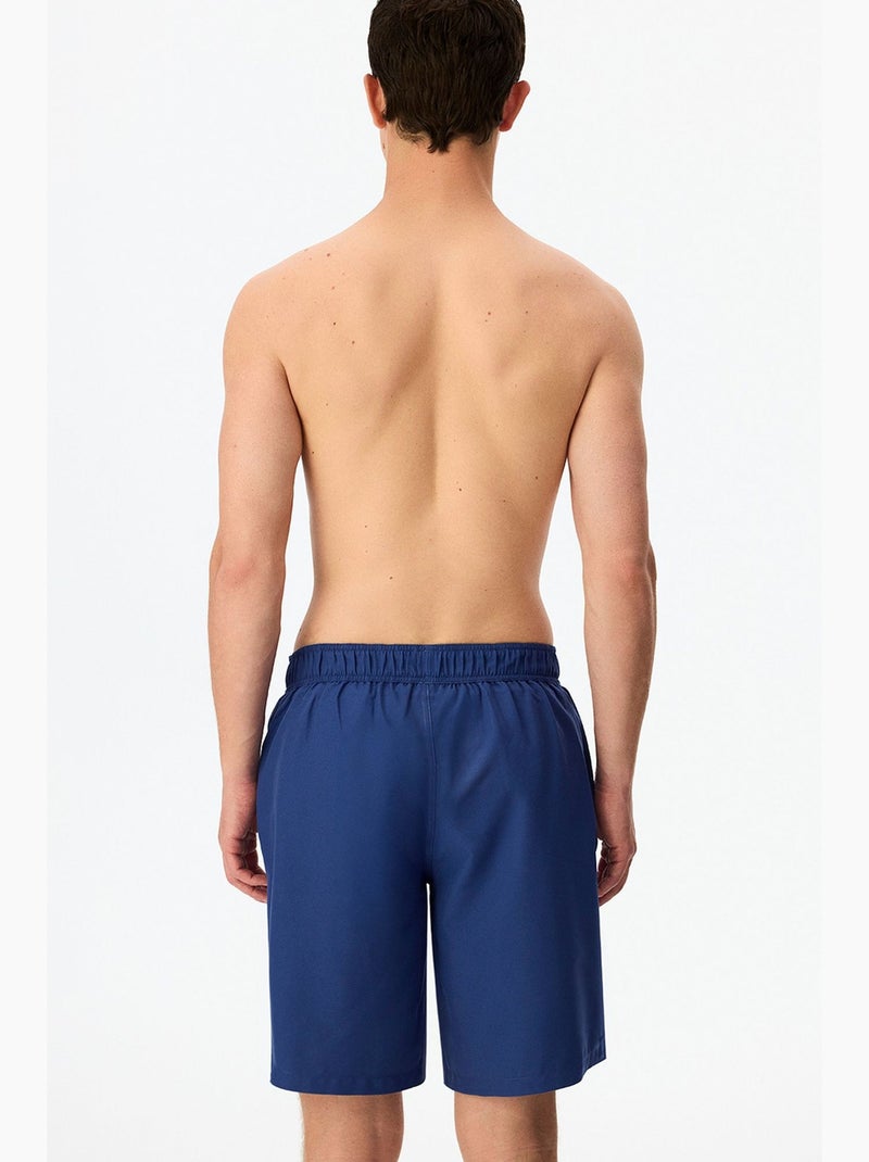 Short masculino surfer com estampa de slogan penti Azul-marinho - Kiabi