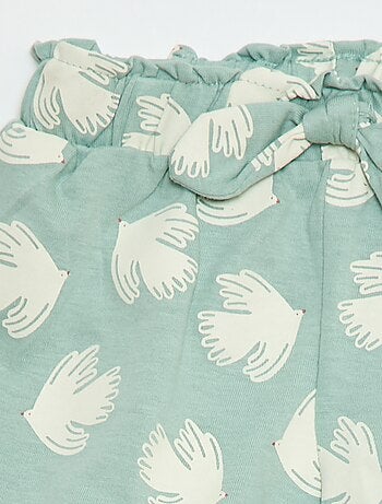 Shorts de algodão com cinto para amarrar e bainha com folhos