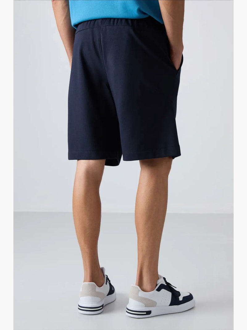 Shorts masculinos em mistura de algodão tommy Azul-marinho - Kiabi