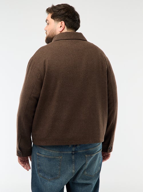 Sobrecamisa com abertura de zíper e bolsos com aba - Kiabi