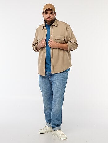 Sobrecamisa em material piqué com abertura de botões de pressão