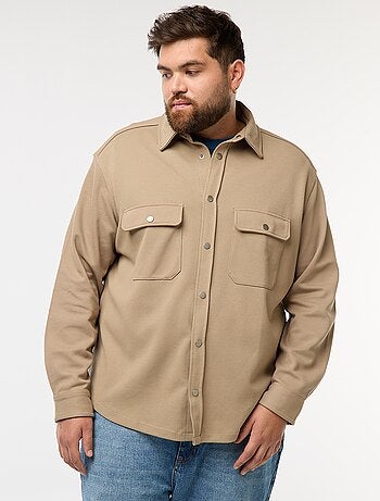 Sobrecamisa em material piqué com abertura de botões de pressão