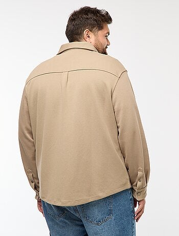 Sobrecamisa em material piqué com abertura de botões de pressão