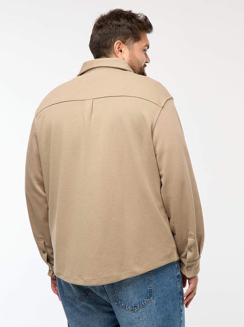 Sobrecamisa em material piqué com abertura de botões de pressão - Kiabi
