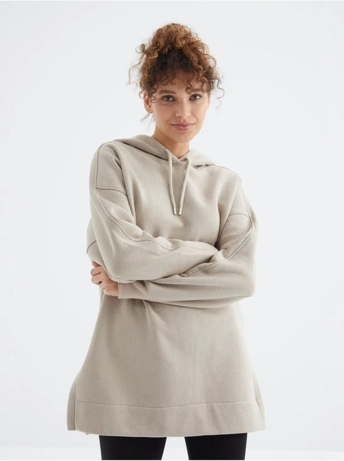 Suéter oversized com bolso tommy - Kiabi Suéter oversized com bolso tommy - Kiabi