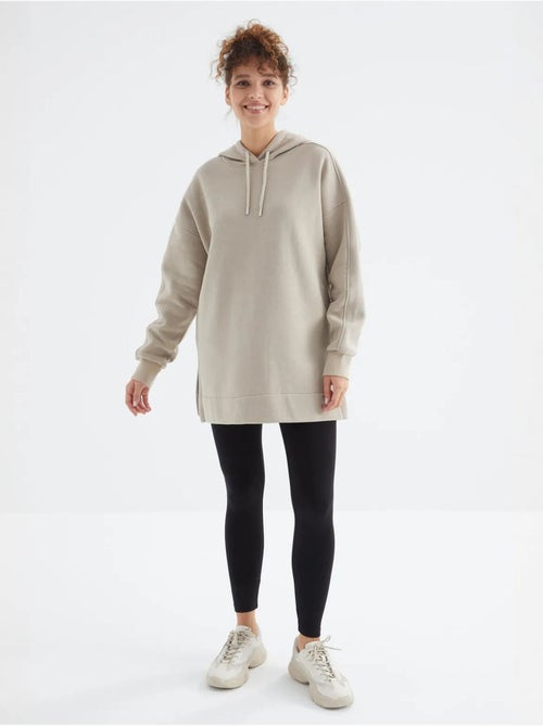 Suéter oversized com bolso tommy - Kiabi Suéter oversized com bolso tommy - Kiabi