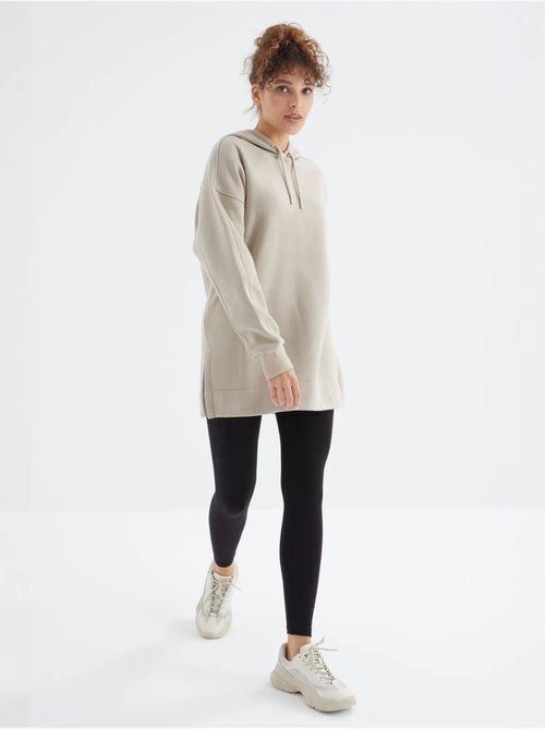 Suéter oversized com bolso tommy - Kiabi Suéter oversized com bolso tommy - Kiabi