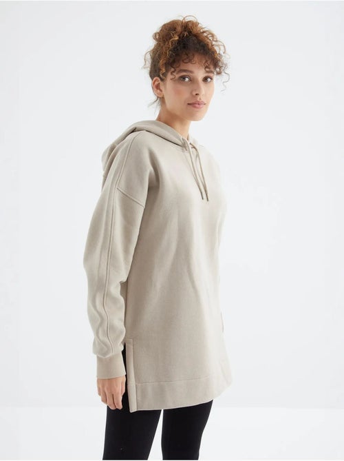 Suéter oversized com bolso tommy - Kiabi Suéter oversized com bolso tommy - Kiabi