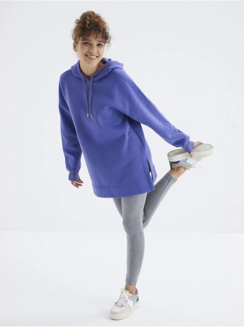 Suéter oversized com bolso tommy - Kiabi Suéter oversized com bolso tommy - Kiabi