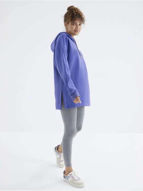 Suéter oversized com bolso tommy - Kiabi Suéter oversized com bolso tommy - Kiabi