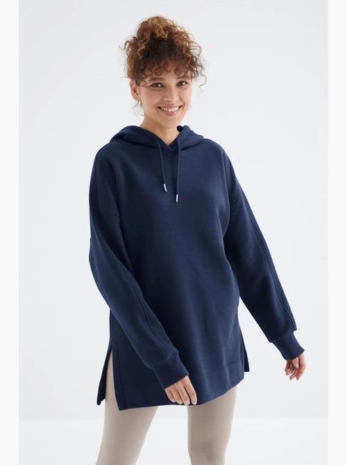Suéter oversized com bolso tommy - Kiabi Suéter oversized com bolso tommy - Kiabi