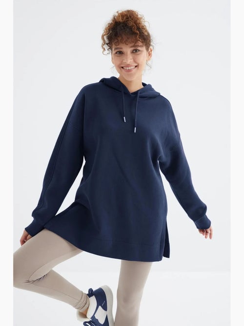 Suéter oversized com bolso tommy - Kiabi Suéter oversized com bolso tommy - Kiabi