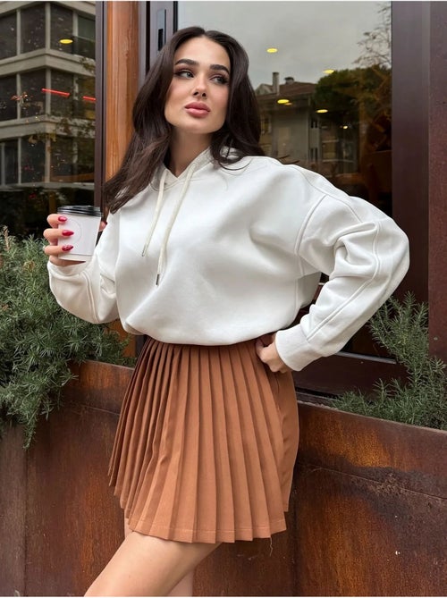 Suéter oversized com bolso tommy - Kiabi Suéter oversized com bolso tommy - Kiabi