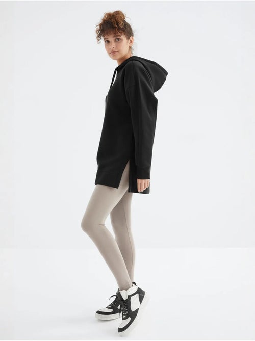 Suéter oversized com bolso tommy - Kiabi Suéter oversized com bolso tommy - Kiabi