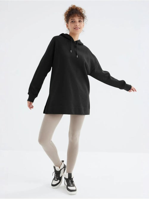 Suéter oversized com bolso tommy - Kiabi Suéter oversized com bolso tommy - Kiabi