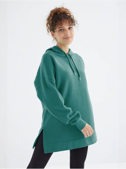 Suéter oversized com bolso tommy - Kiabi Suéter oversized com bolso tommy - Kiabi