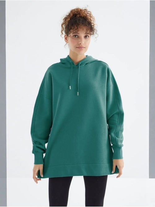 Suéter oversized com bolso tommy - Kiabi Suéter oversized com bolso tommy - Kiabi