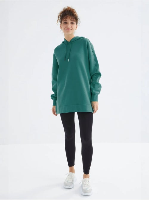 Suéter oversized com bolso tommy - Kiabi Suéter oversized com bolso tommy - Kiabi