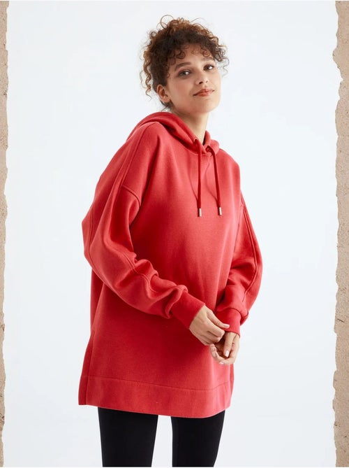 Suéter oversized com bolso tommy - Kiabi Suéter oversized com bolso tommy - Kiabi