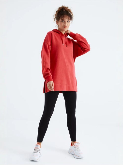Suéter oversized com bolso tommy - Kiabi Suéter oversized com bolso tommy - Kiabi