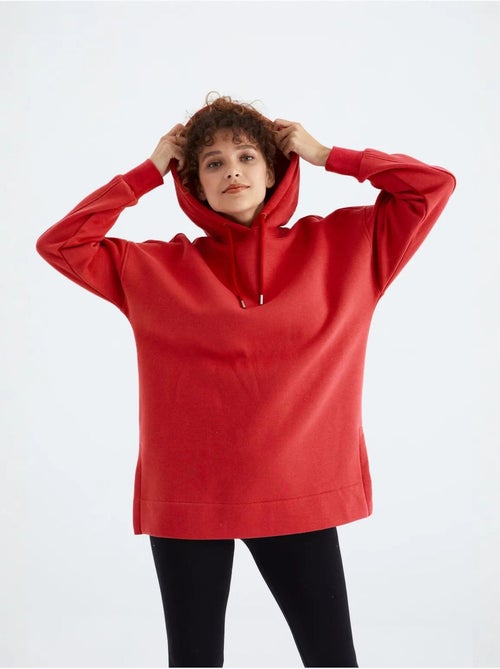 Suéter oversized com bolso tommy - Kiabi Suéter oversized com bolso tommy - Kiabi