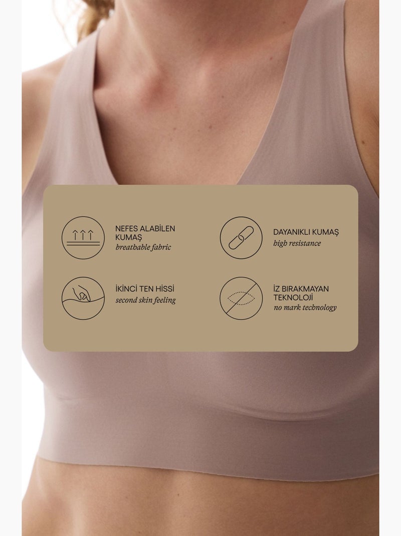 Sutiã esportivo zero feel com suporte médio e bojos removíveis penti Malva - Kiabi