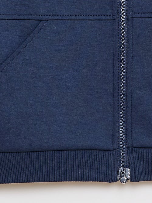 Sweat com fecho e capuz - coleção fácil de vestir - Kiabi Sweat com fecho e capuz - coleção fácil de vestir - Kiabi