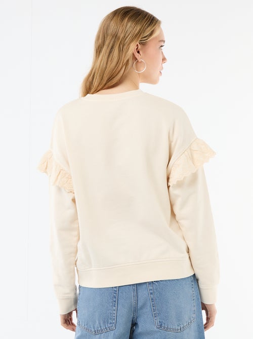 Sweat liso com folhos em bordado inglês nas mangas - Kiabi