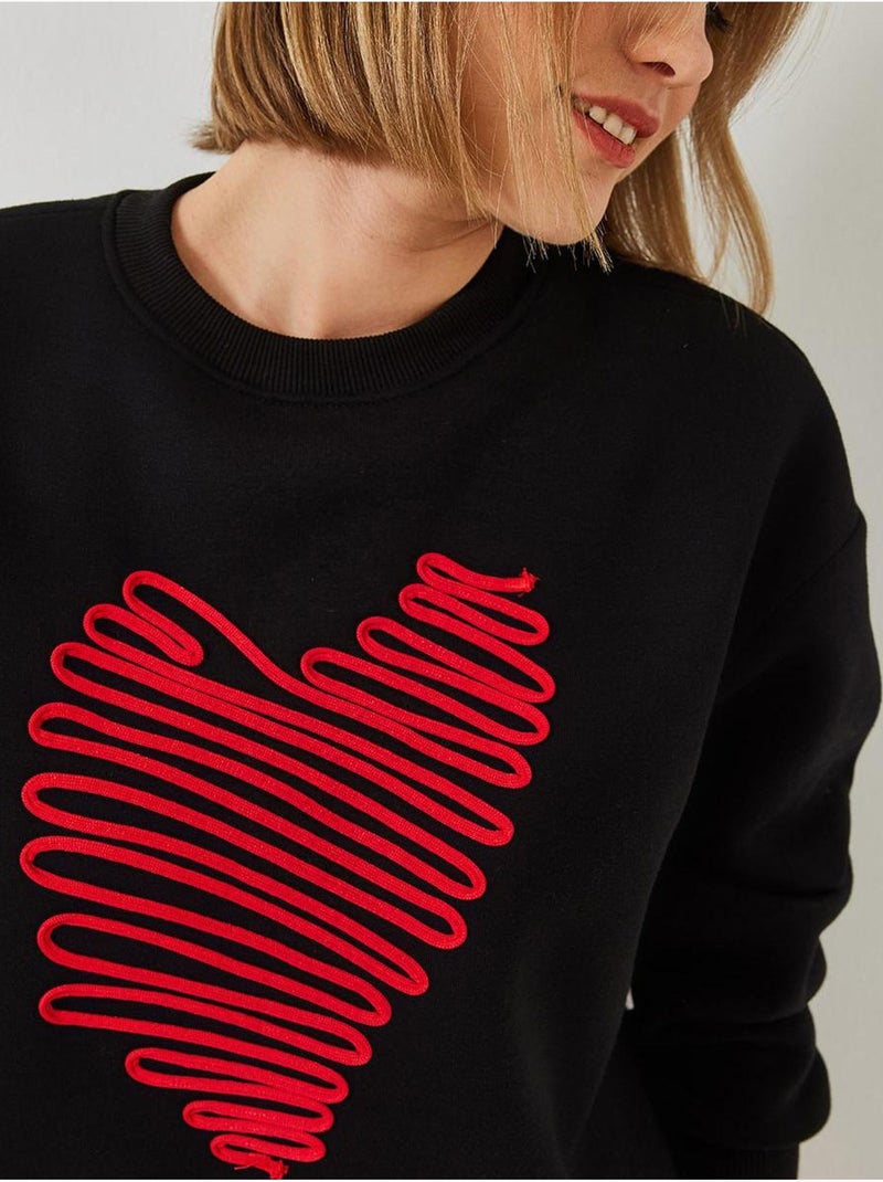 Sweatshirt bordada com coração lucci Preto - Kiabi
