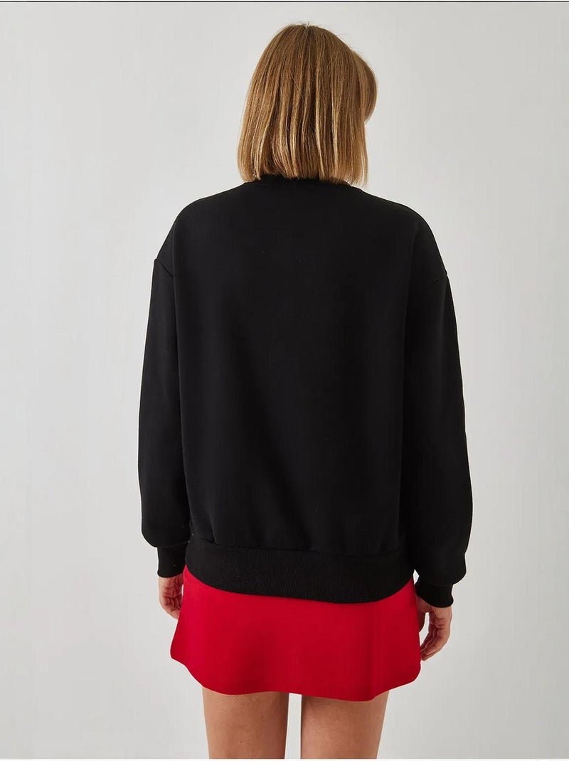 Sweatshirt bordada com coração lucci Preto - Kiabi